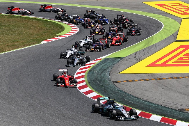 MONTMELO, SPAIN - MAY 10: Nico Rosberg of Germany and Mercedes GP leads Sebastian Vettel of Germany and Ferrari and Lewis Hamilton of Great Britain and Mercedes GP into the second corner during the Spanish Formula One Grand Prix at Circuit de Catalunya on May 10, 2015 in Montmelo, Spain. (Photo by Clive Mason/Getty Images)